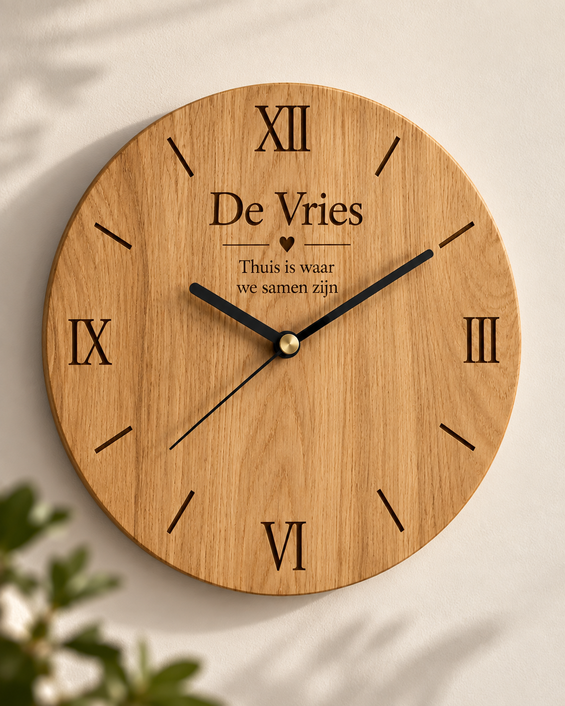 Personalised oak wall clock engraved with De Vries family name and Dutch home quote