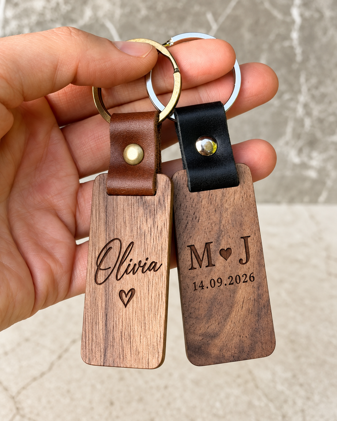 Personalised wooden keychains in oak and American walnut with genuine leather, engraved with a name and date
